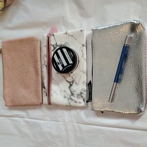 Ipsy mettalic cosmetic Bags 3 each plus 2 products